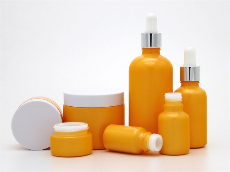 orange opal glass bottles and jars