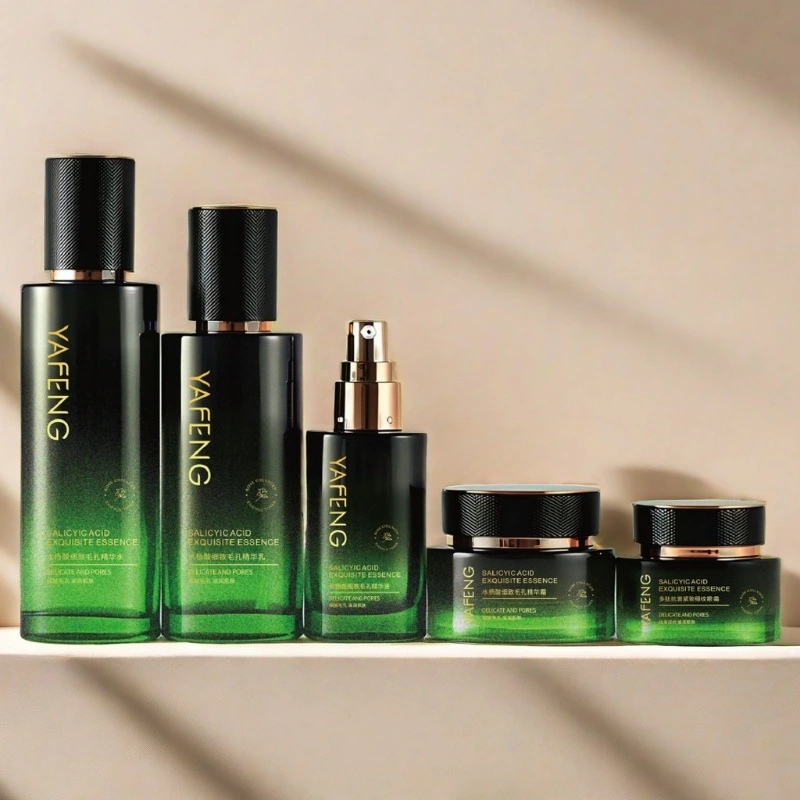 gradient green glass skincare bottle